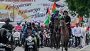 Aksi itu untuk menguatkan solidaritas dan dukungan yang mulai berkurang terhadap Palestina. (CHAIDEER MAHYUDDIN/AFP)