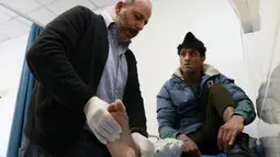 Dalam waktu kurang dari dua dekade sekitar 8.367 pasien dari berbagai negara Timur Tengah yang sedang berkonflik, seperti Irak, Yaman, Palestina, Sudan, Libya dan Suriah, mendapat perawatan.di Rumah Sakit Al-Mosawah di di Amman, Yordania. (Khalil MAZRAAWI/AFP)