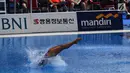 Atlet loncat indah Indonesia, Yasmin Linadini tampil dalam nomor women's 3M Spring Board Asian Games 2018 di Jakarta, Sabtu (1/9). Posisi pertama diisi Shi Tingmao (384.90), sedangkan kedua diisi Wang Han (372.95). (Merdeka.com/Imam Buhori)