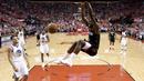 Aksi pemain Houston Rockets, Clint Capela melakukan dunks saat melawan Golden State Warriors pada gim kelima final NBA basketball Wilayah Barat di Toyota Center, Houston, (24/5/2018). Houston menang 98-94. (AP/David J. Phillip)