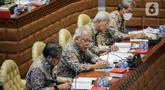 Menteri Pekerjaan Umum dan Perumahan Rakyat (PUPR) Basuki Hadimuljono mengikuti Rapat Kerja dengan Komisi V DPR RI di Kompleks Parlemen, Senayan, Jakarta, Rabu (7/6/2023). (Liputan6.com/Faizal Fanani)