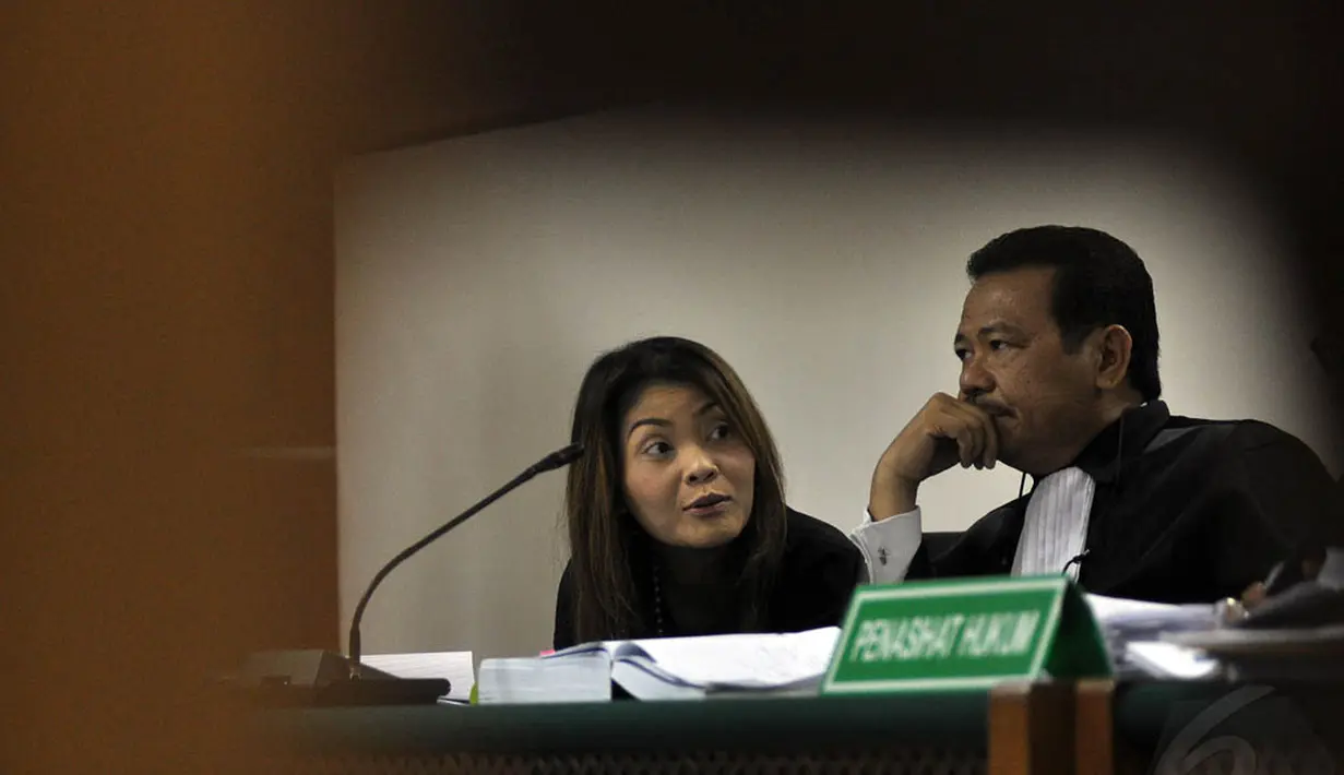 Artha Meris Simbolon ditetapkan sebagai tersangka karena diduga memberikan suap kepada Rudi Rubiandini selaku Kepala SKK Migas, Jakarta, (12/10/14). (Liputan6.com/Miftahul Hayat) 