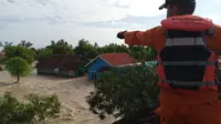 Kondisi pemukuman warga ya banjir karena tanggul jebol Sungai Citarum. (Dok Istimewa)