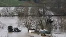 Foto menunjukkan kondisi sebuah rumah yang terendam banjir setelah hujan lebat yang menyebabkan banjir Sungai Garonne di Sainte-Croix-du-Mont, Prancis barat pada Kamis 19 Februari 2026. Wilayah barat daya Prancis menghadapi krisis banjir hebat akibat meluapnya Sungai Garonne. (ROMAIN PERROCHEAU/AFP)