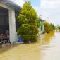 Banjir di Gresik akibat tanggul Mojosarirejo jebol. (Dian Kurniawan/Liputan6.com)