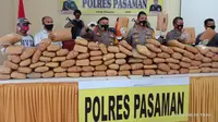 Kepolisian resor Pasaman menangkap dua tersangka yang membawa narkoba dari Sumatera Utara. (Liputan6.com/ Dok Polres Pasaman).