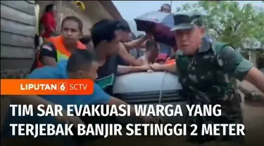 Hujan deras mengakibatkan banjir hingga setinggi 2,5 meter di Kota Padang, Sumatra Barat. Tim SAR Gabungan terpaksa mengevakuasi warga serta bayi yang terjebak banjir bandang di kawasan Lubuk Begalung.