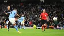 Gelandang Manchester City, Riyad Mahrez mencetak gol ketiga timnya ke gawang Sevilla dalam laga fase Grup G Liga Champions 2022/2023 di Etihad Stadium, Manchester (2/11/2022). Sempat tertinggal 0-1 dari Sevilla hingga akhir babak pertama, Manchester City mampu bangkit di babak kedua dengan mencetak tiga gol untuk membungkus kemenangan 3-1. (AFP/Oli Scarff)