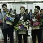 Menpora, Imam Nahrawi dan Ketua PBSI, Wiranto, menyambut kedatangan pasangan ganda putra Kevin Sanjaya dan Marcus Gideon di Bandara Soekarno Hatta, Senin (18/12/17). Kevin-Marcus berhasil menjuarai Dubai Super Series 2017. (Bola.com/M Iqbal Ichsan)