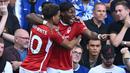 Selebrasi gelandang Nottingham Forest, Anthony Elanga (kanan) setelah mencetak gol ke gawang Chelsea pada laga Liga Inggris 2023/2024 di Stamford Bridge, London (2/9/2023). Anthony Elanga didatangkan Nottingham Forest dari Manchester United setelah sang pemain minim kesempatan bermain bersama Setan Merah. Anthony Elanga dikontrak selama 5 tahun hingga 30 Juni 2028 dengan nilai transfer 17,5 juta euro. (AFP/Justin Tallis)