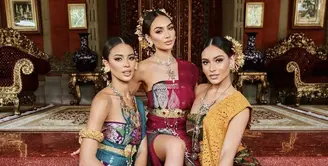 R'Bonney, Andreina, dan Gabriella tampil dengan baju adat Bali dengan gaya off shoulder dan bawahan kain songket dengan model slit. @missuniverse_id