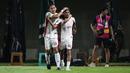 Pemain Garudayaksa FC, Alfin Kelilauw (kanan) dan Komang Tri Arta Wiguna merayakan gol pertama timnya ke gawang PSS Sleman dalam laga final Pegadaian Liga 2 2025/2026 di Stadion Maguwoharjo, Sleman, Yogyakarta, Sabtu (09/05/2026). (Bola.com/Abdul Aziz)