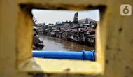 Suasana permukiman padat penduduk di bantaran Sungai Ciliwung, kawasan Manggarai, Jakarta, Rabu (14/5/2025). (Liputan6.com/Angga Yuniar)