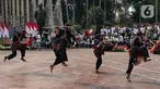 Penari Reog Ponorogo melakukan performance art saat Parade dan Apel Pancasila Sakti di kawasan Tugu Proklamasi, Jakarta Pusat, Minggu (1/10/2023). Kegiatan menyambut Hari Kesaktian Pancasila ini dipimpin Ketua Umum DPP PKB Abdul Muhaimin Iskandar (Gus Imin). (merdeka.com/Arie Basuki)