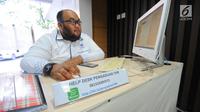 Petugas berjaga di posko pengaduan tunjangan hari raya (THR) di Kementerian Ketenagakerjaan, Jakarta, Senin (20/5/2019). Posko tersebut untuk mempermudah para pekerja menyampaikan keluhannya, terkait penerimaan hak mendapatkan THR dari perusahaan. (Liputan6.com/Angga Yuniar)
