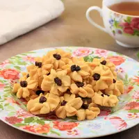 ilustrasi kue semprit/Ika Rahma H/Shutterstock