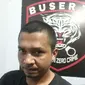 Achfi Suhasim alias Afid (29) pelaku pembunuhan presenter TVRI Kendari.(Liputan6.com/Ahmad Akbar Fua)