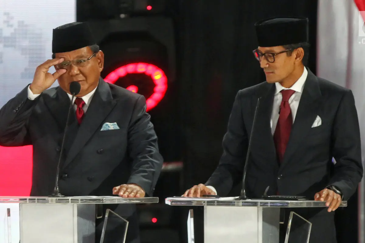 Ekspresi Prabowo - Sandiaga Uno Saat Debat Kelima Pilpres 2019
