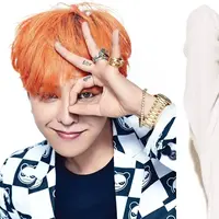 G-Dragon kepergok mencium seorang wanita yang diduga Sandara Park.