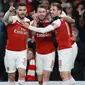 Gelandang Arsenal, Aaron Ramsey berselebrasi dengan rekan setimnya setelah mencetak gol ke gawang Napoli pada leg pertama perempat final Liga Eropa di Stadion Emirates, Kamis (11/4). Arsenal mendekatkan diri ke semifinal setelah berhasil mengalahkan Napol