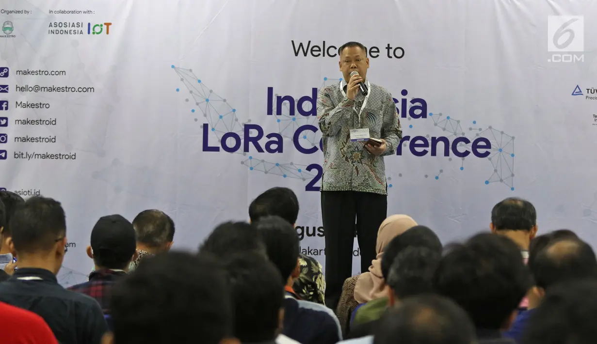 Direktur Standarisasi Perangkat Pos dan Informatika Ditjen SDPPI, Mochamad Hadiyana menjadi pembicaraan dalam  Indonesia Long Range Conference (IDLoRaCon) 2019 di Function Hall Studio 6 Emtek City, Jakarta, Rabu (14/8/2019). (Liputan6.com/Herman Zakharia)