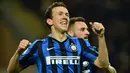 Penyerang Inter Milan, Ivan Perisic, merayakan gol yang dicetaknya ke gawang Bologna. Gol kemenangan Inter Milan dicetak oleh Ivan Perisic dan Danilo D'Ambrosio. (AFP/Giuseppe Cacace)