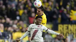 Bayer Leverkusen menahan imbang tuan rumah Borussia Dortmund 1-1. (AP Photo/Martin Meissner)