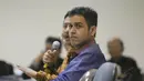 Sebelum sidang dimulai, Nazar sempat meminta Andi agar pindah tempat duduk di sebelah Anas. Padahal, kursi antara Anas dan Andi tersedia untuk Nazar, Selasa (13/5/14).(Liputan6.com/Johan Tallo) 