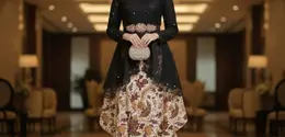 Gamis Batik Brokat dengan Kombinasi Sifon/Gemini AI.
