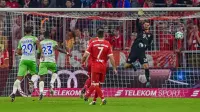 Bayern Munchen haru puas bermain 2-2 kontra VfL Wolfsburg pada pekan keenam Bundesliga, di Allianz Arena, Kamis (22/9/2017). (AFP/Guenter Schiffmann)