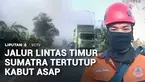 Kabut asap dampak kebakaran lahan menutup sebagian Jalur Lintas Timur Sumatra di wilayah Palembang-Indralaya. Jarak pandang yang terbatas akibat kabut asap membuat pengendara harus berhati-hati saat melaju.