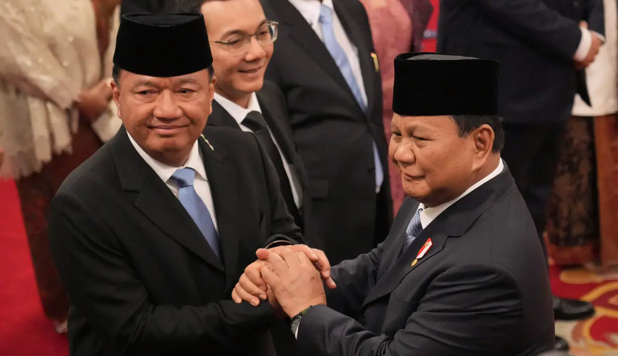 Sebelumnya, Presiden Prabowo Subianto resmi mengumumkan nama jajaran menteri, dan kepala badan setingkat menteri dalam Kabinet Prabowo-Gibran pada Minggu (20/10/2024) malam. (AP Photo/Achmad Ibrahim)