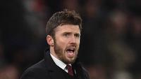 Legenda lini tengah Old Trafford itu akan memimpin The Red Devils hingga akhir musim ini. Tampak dalam foto, Michael Carrick saat masih menjadi pelatih sementara Manchester United memberi isyarat di pinggir lapangan selama pertandingan sepak bola Liga Premier Inggris melawan Arsenal di Old Trafford, Manchester, Inggris barat laut, pada 2 Desember 2021. (Oli SCARFF/AFP)