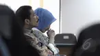 Walikota nonaktif Kota Palembang, Romi Herton bersama Istri, Masyito mendengarkan pembacaan vonis saat menjalani sidang di Pengadilan Tipikor, Jakarta, Senin (9/3/2015). (Liputan6.com/Andrian M Tunay)