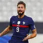 Striker Prancis, Olivier Giroud, melakukan selebrasi usai mencetak gol ke gawang Ukraina pada laga uji coba di Stade deFrance, Kamis (8/10/2020). Prancis menang dengan skor 7-1. (AP Photo/Francois Mori)