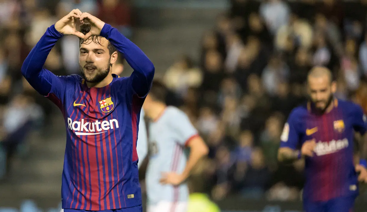 Pemain Barcelona, Jose Arnaiz merayakan gol ke gawang Celta Vigo pada pertandingan leg pertama babak 16 besar Copa del Rey di Stadion Balaidos, Kamis (4/1). Barcelona unggul lebih dulu sebelum Celta Vigo menyeimbangkan skor 1-1. (AP/Lalo R. Villar)
