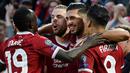 Para pemain Liverpool merayakan gol yang dicetak oleh gelandang Liverpool, Emre Can, pada laga playoff Liga Champions, di Stadion Anfield, Kamis (24/8/2017). Liverpool menang 4-2 atas Hoffenheim. (AFP/Oli Scarff)