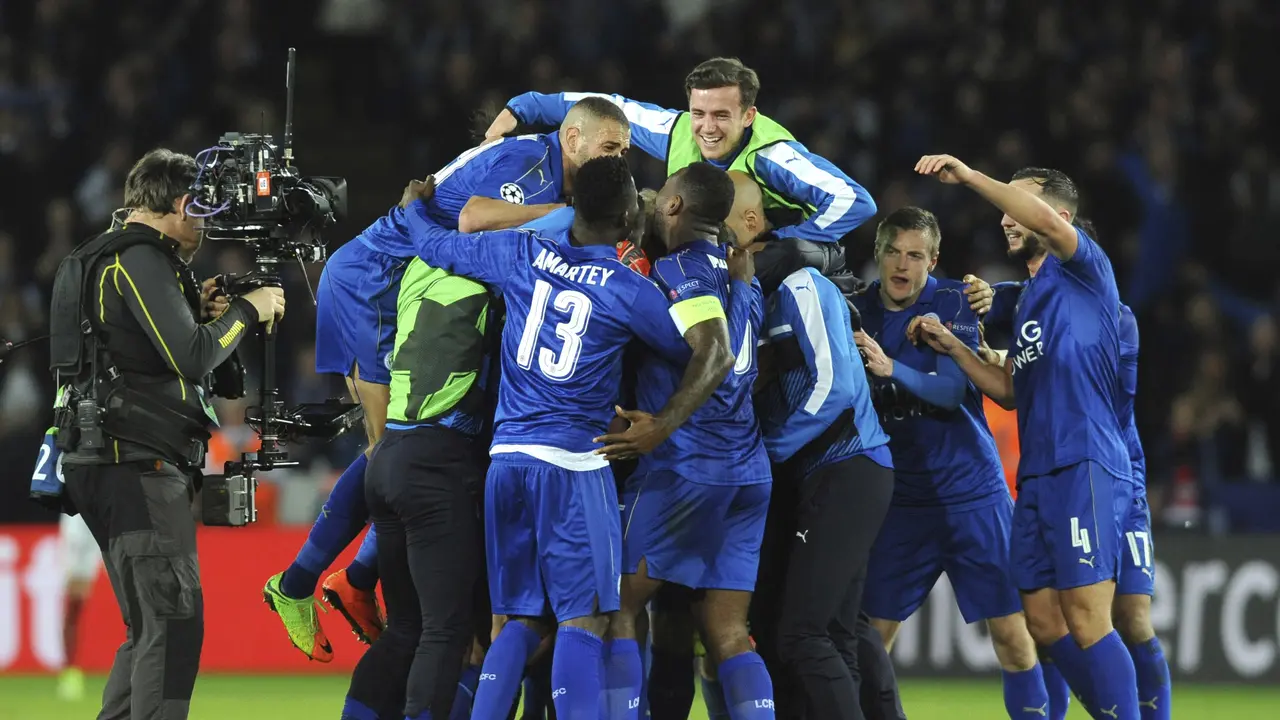 Laju Leicester City di Liga Champions mengancam partisipasi peringkat 4 Liga Inggris pada kompetisi primer antarklub Eropa musim depan. 