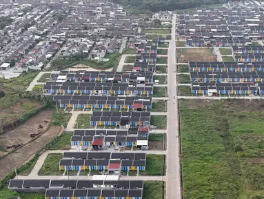 Foto udara salah satu kawasan perumahan bersubsidi di Parung Panjang, Kabupaten Bogor, Jawa Barat, Kamis sore (19/9/2024). (merdeka.com/Arie Basuki)