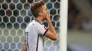 Kekesalan Gelandang Jerman Marco Reus setelah gagal mencetak gol ke gawang Georgia selama pertandingan kualifikasi EURO 2016 grup D di Leipzig, Jerman, Senin (12/10/2015). Gol Jerman dicetak Muller dan Max Kruse. (REUTERS/Fabrizio Bensch)