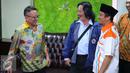 Ustadz Yusuf Mansyur dan Direktur PT Indofood Sukses Makmur Tbk, Fransiscus Welirang berbincang dengan Direktur Jenderal Pajak Ken Dwijugiasteadi di Dirjen Pajak, Jakarta, (30/9). (Liputan6.com/Angga Yuniar)