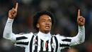 Ekspresi pemain Juventus, Juan Cuadrado, setelah tendangannya gagal dihalau pemain Genoa dan berbuah gol dalam lanjutan Serie A Italia di Stadion Juventus, Turin, Kamis (4/2/2016) dini hari WIB. (AFP/Marco Bertorello)