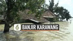 Musibah banjir masih melanda sebagian wilayah Kabupaten Karawang hari Kamis (11/2). Ribuan rumah di 18 kecamatan masih terendam banjir.