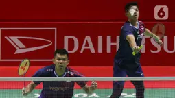 Kepastian ini didapat setelah menaklukkan pasangan Malaysia Low Hang Yee/Ng Eng Cheong dengan rubber game 16-21, 21-7, dan 21-16. (Liputan6.com/Herman Zakharia)