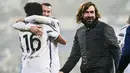 Pelatih Juventus, Andrea Pirlo, tampak bahagia usai menjuarai Piala Super Italia di Stadion Mapei, Rabu (20/1/2021). Juventus menang dengan skor 2-0 atas Napoli. (AFP/Miguel Medina)