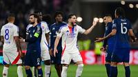 Duel Olympique Lyon dan Manchester United (MU) dalam laga leg pertama perempat final Liga Europa yang digelar di Stadion Groupama, Decines-Charpieu, Jumat (11/4/2025) dini hari WIB. (Olivier CHASSIGNOLE / AFP)