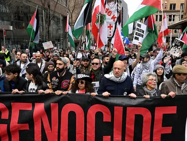 Ratusan pengunjuk rasa pro-Palestina berbaris di jalan-jalan di kawasan pusat bisnis di Sydney pada tanggal 4 Agustus 2024. (Saeed KHAN/AFP)