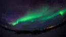 Fenomena Aurora Borealis yang menari-nari di langit Kautokeino, Norwegia, Rabu (15/3). Aurora adalah nama Dewi Fajar Romawi dan Boreas adalah Angin Utara dalam bahasa Yunani. (AFP PHOTO / Jonathan NACKSTRAND)