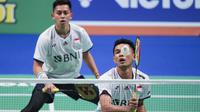 Fajar Alfian/Muhammad Rian Ardianto yang diunggulkan di posisi ke-5 harus berhadapan dengan kompatriotnya Marcus Fernaldi Gideon/Kevin Sanjaya Sukamuljo sebagai unggulan kedua di partai pamungkas usai keduanya sama-sama mengalahkan pasangan Malaysia di laga semifinal. (AFP/Ritzau Scanpix/Claus Fisker)
