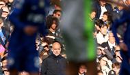 Manajer Manchester City, Pep Guardiola, berhasil membawa anak asuhnya meraih kemenangan 3-0 atas Chelsea pada laga pekan ke-32 Premier League musim ini di Stamford Bridge, Minggu (12/04/2026) malam WIB. (AFP/Adrian Dennis)